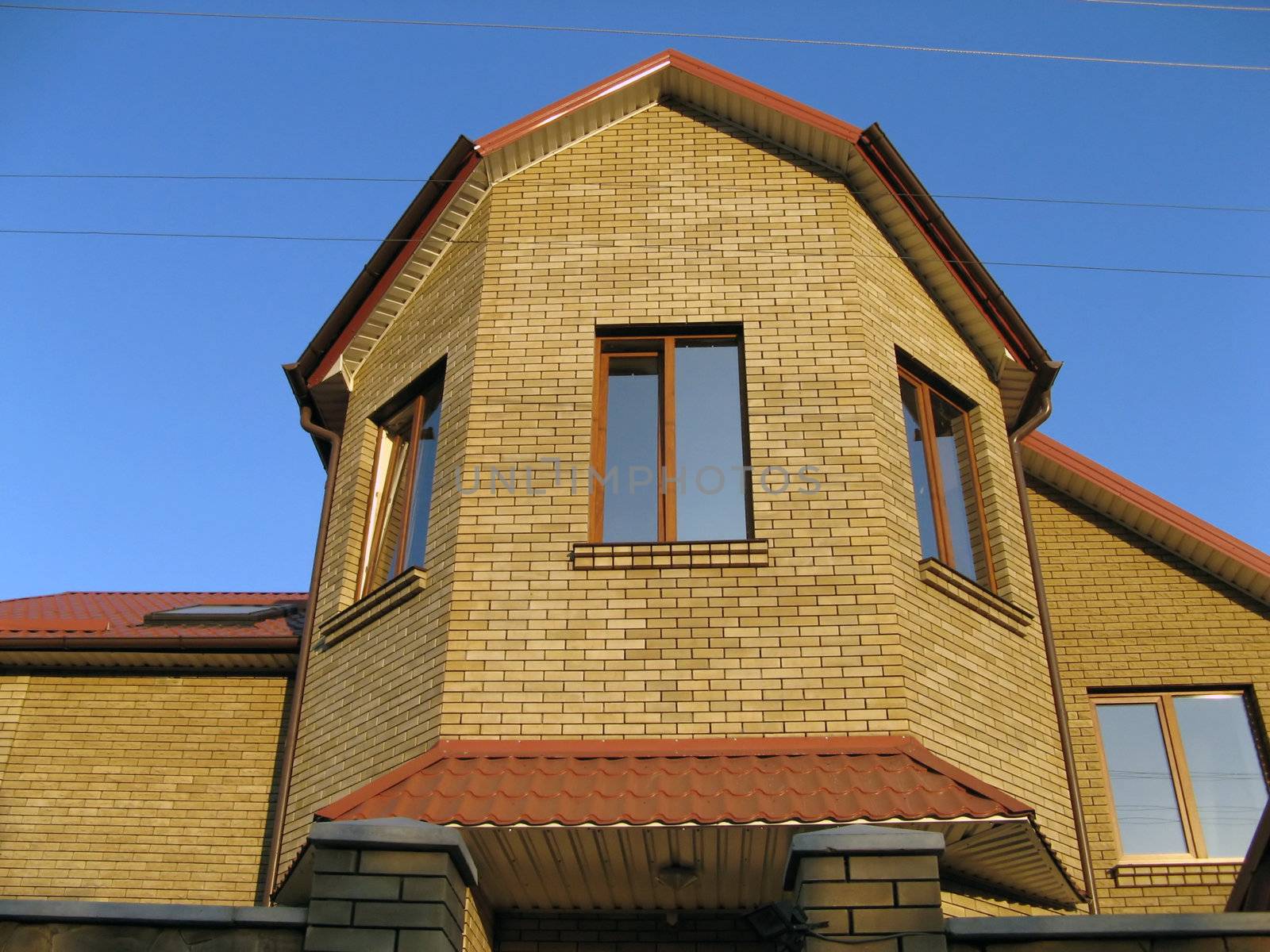 a recently constructed, contemporary house of bricks 