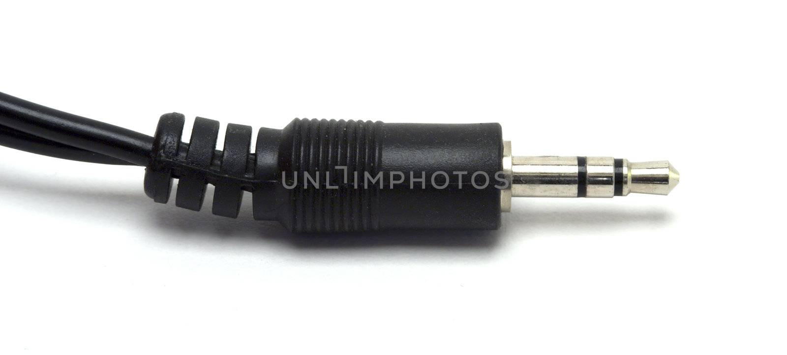 Closeup, isolated shot of a 1/8 stereo cable against a white background.
