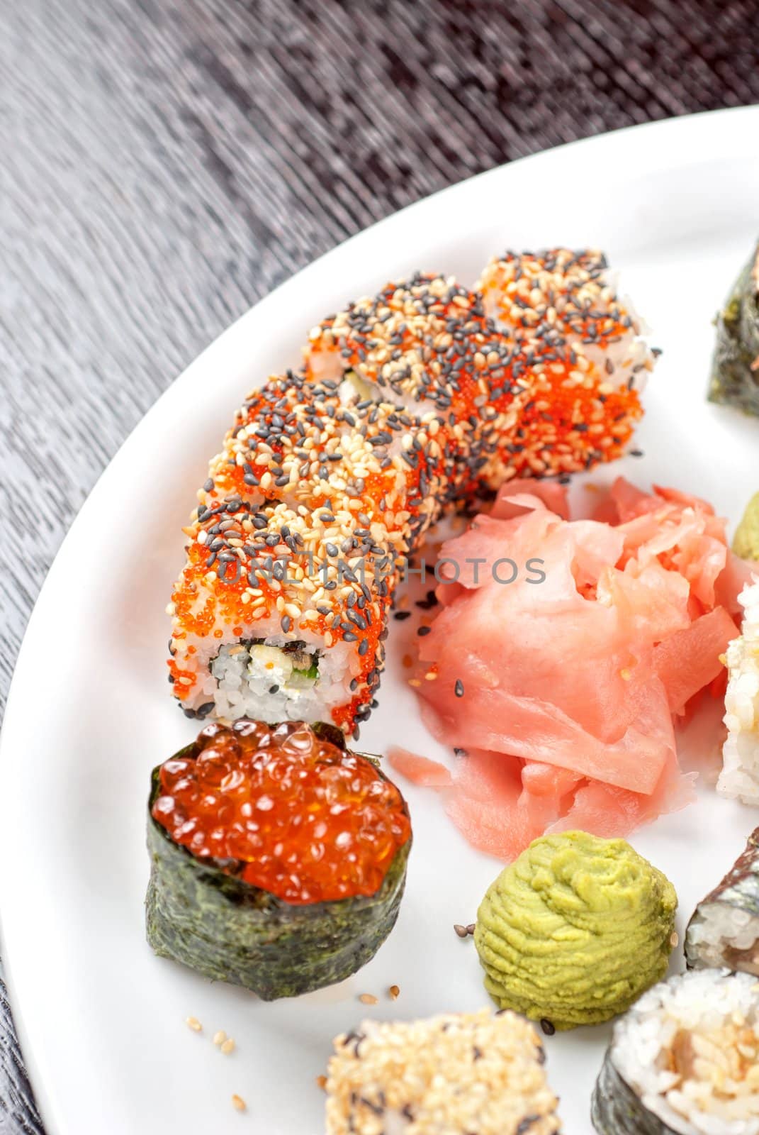 japanese sushi set with red caviar sushi in the foreground