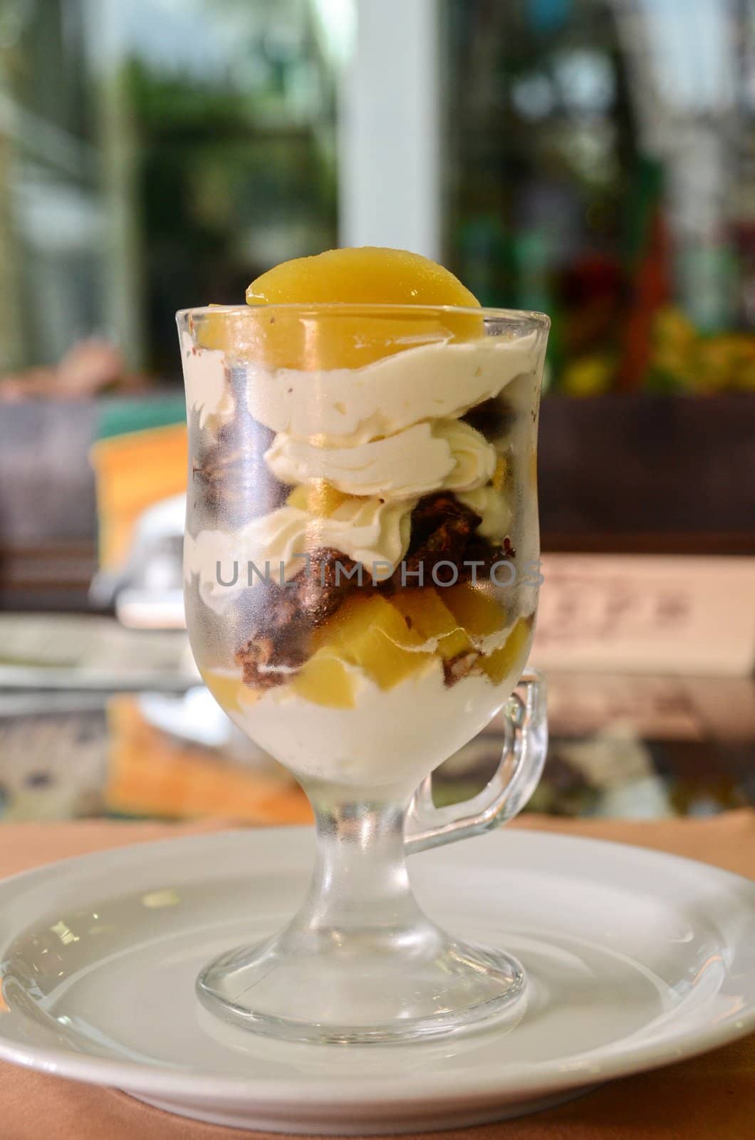 fresh baked cupcake with orange slices on a plate