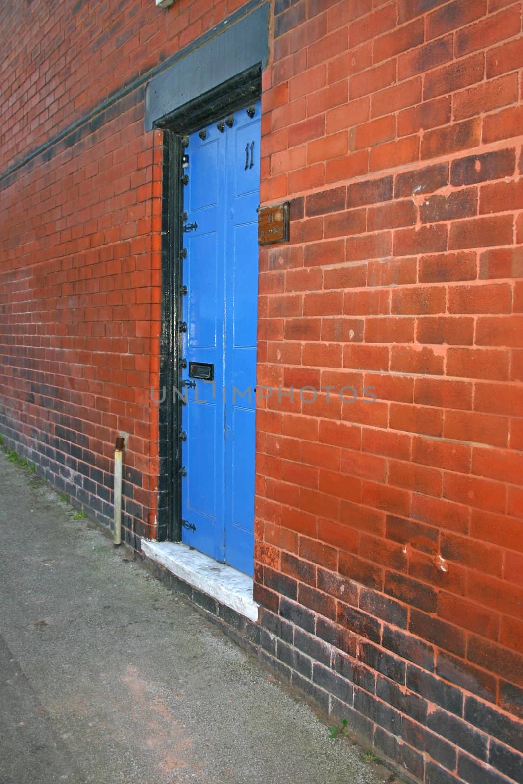 Blue Door in the Side of a House