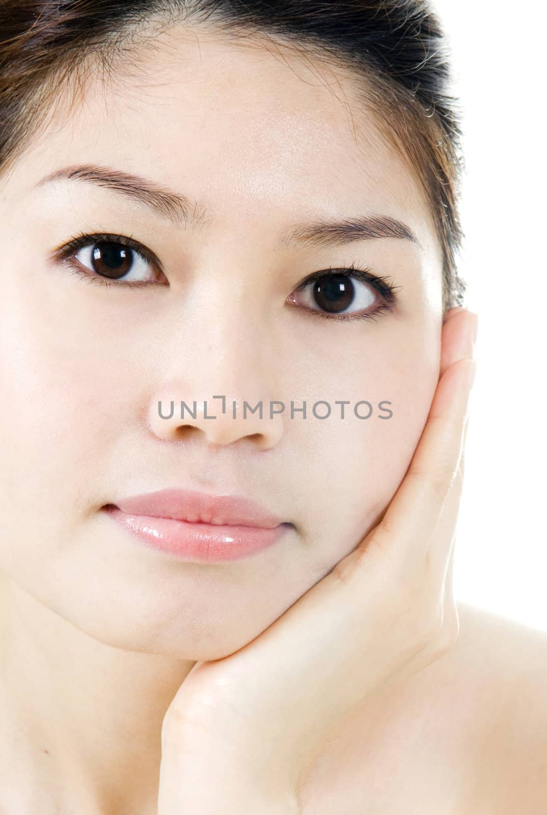 Close up isolated portrait of Asian beauty.
