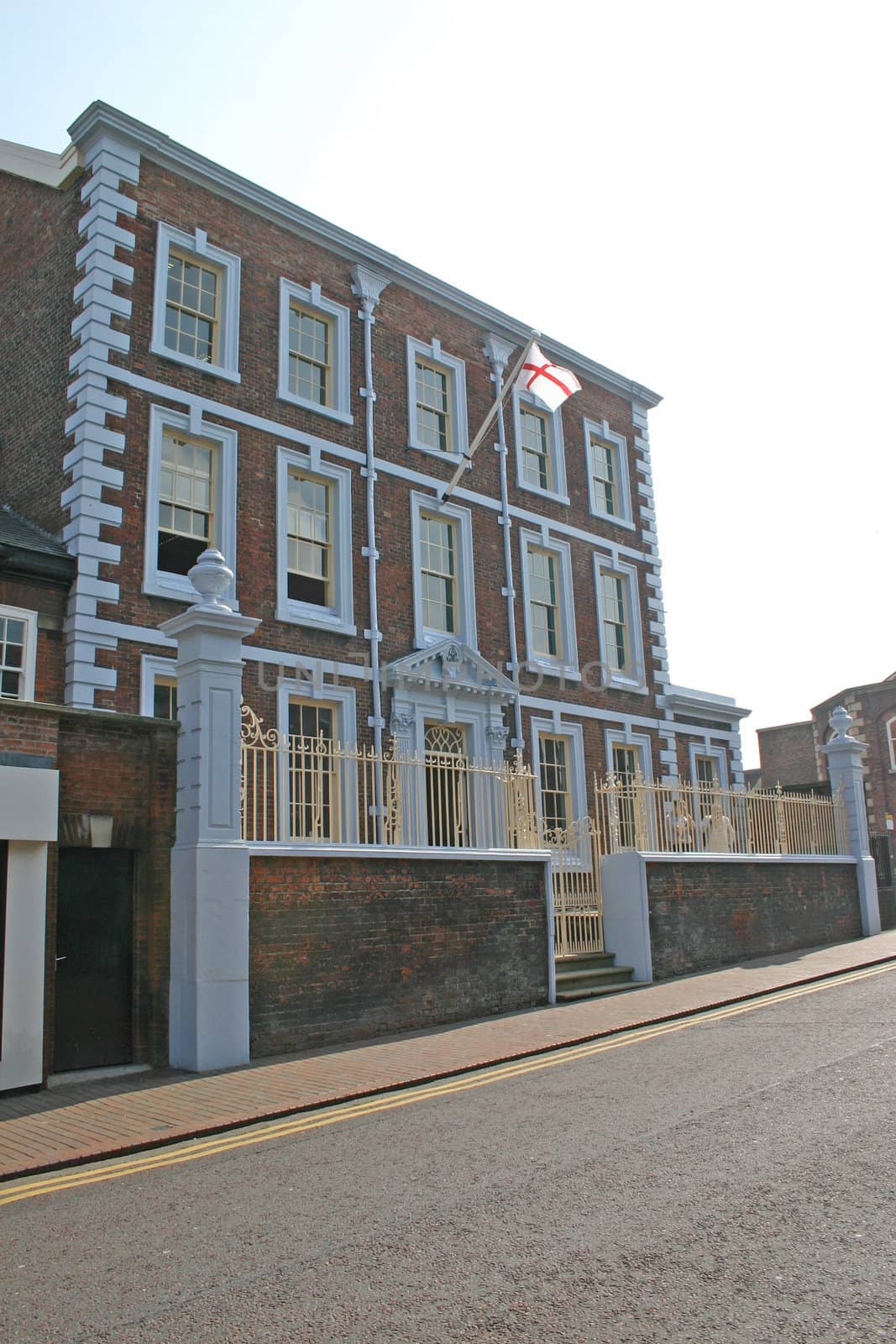 Grand Old Building Flying St Georges Flag on Flagpole