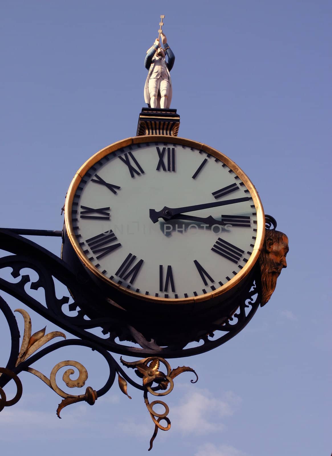 Street Clock with Trumpeter on Top