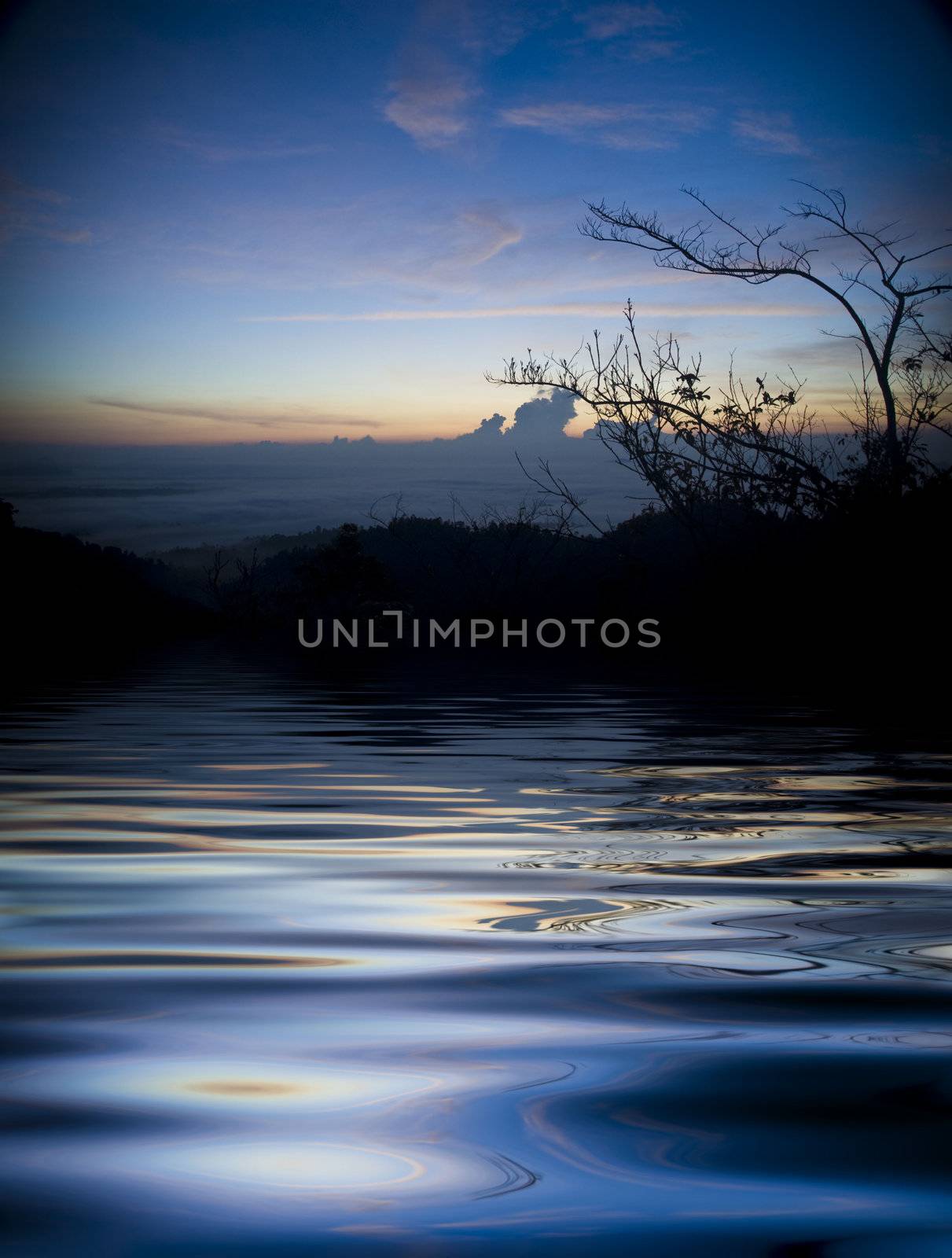 Sunrise over a peaceful lake 