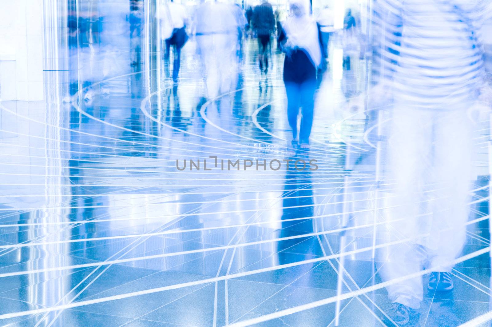 A shopping mall. Long exposure for intentional motion blur of people.