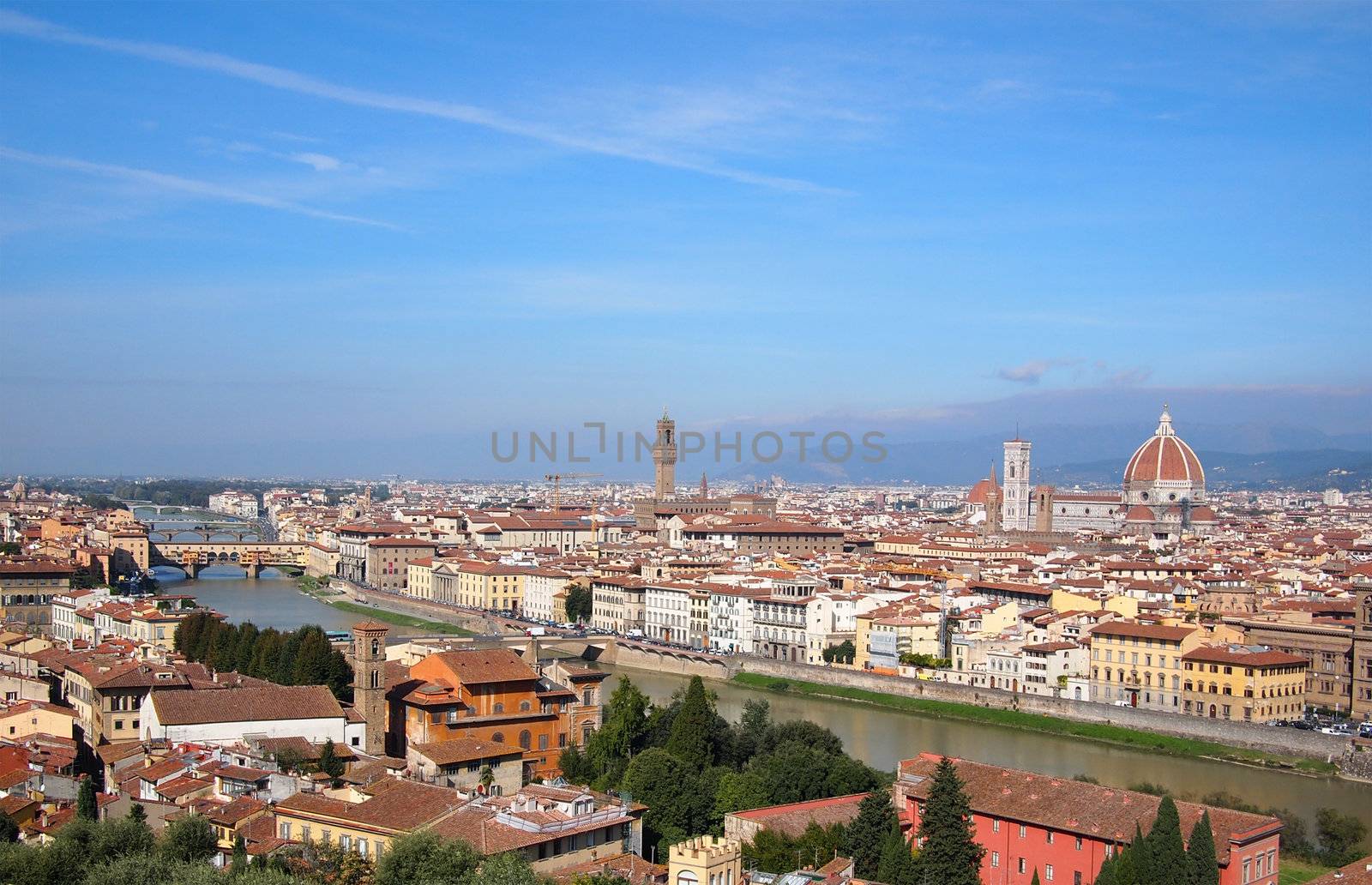 Overview over Florence, Italy, including cathedral and ponte vecchio.