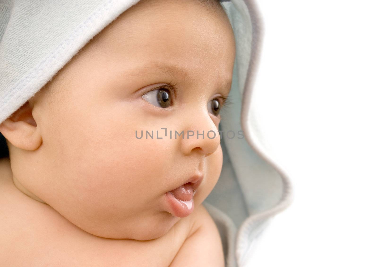 Cute baby with towel after taking bath