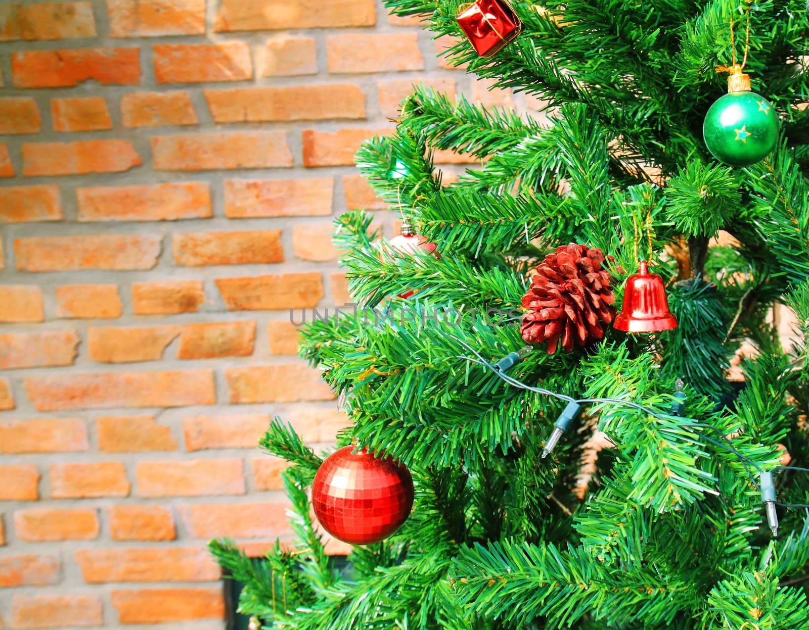 Christmas tree with brick wall and space