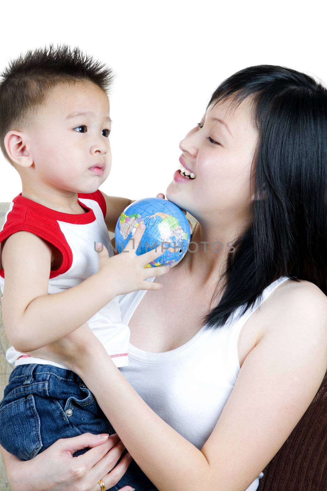 Portrait of a happy mother playing with her son 