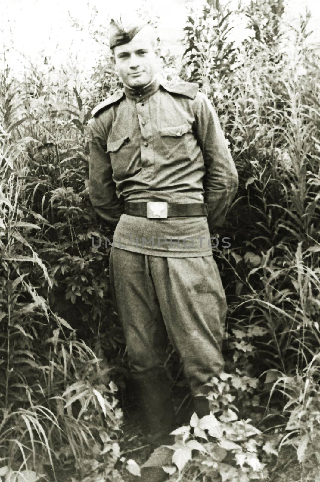 The Soviet soldier on an ancient photo of 1945