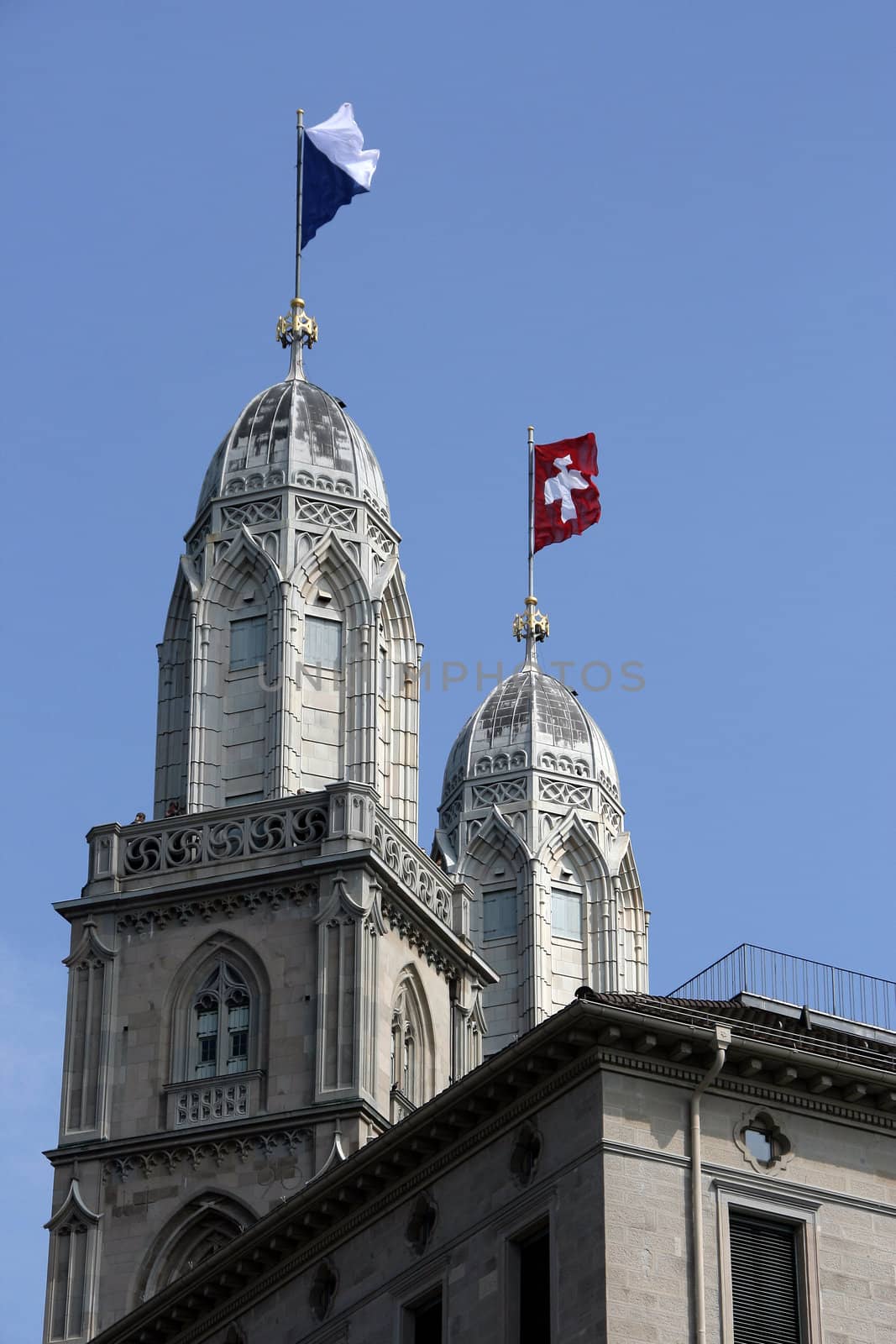 Two towers with flags of country and canton