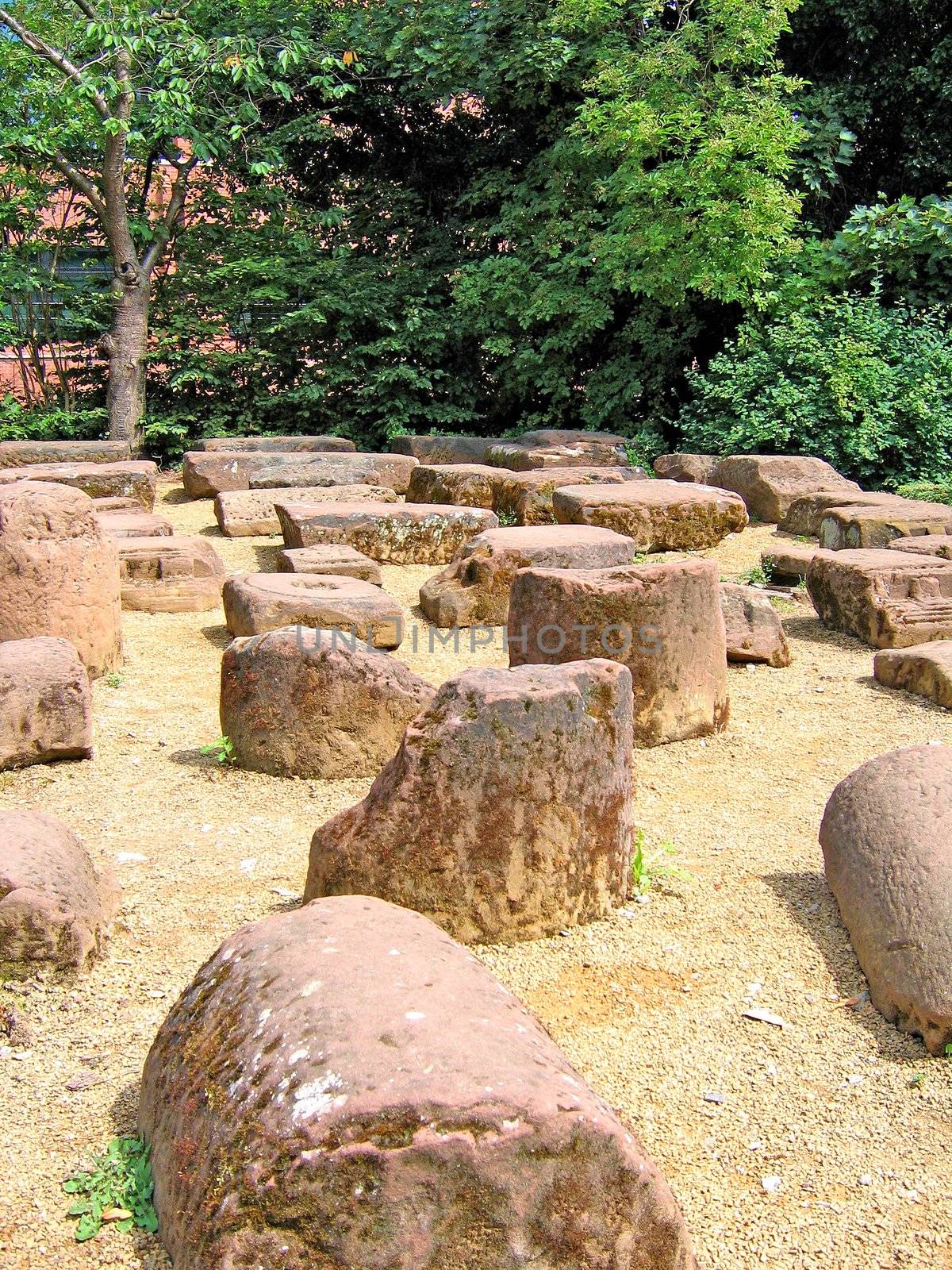 Bases of various Roman pillars in a public garden in Chester.