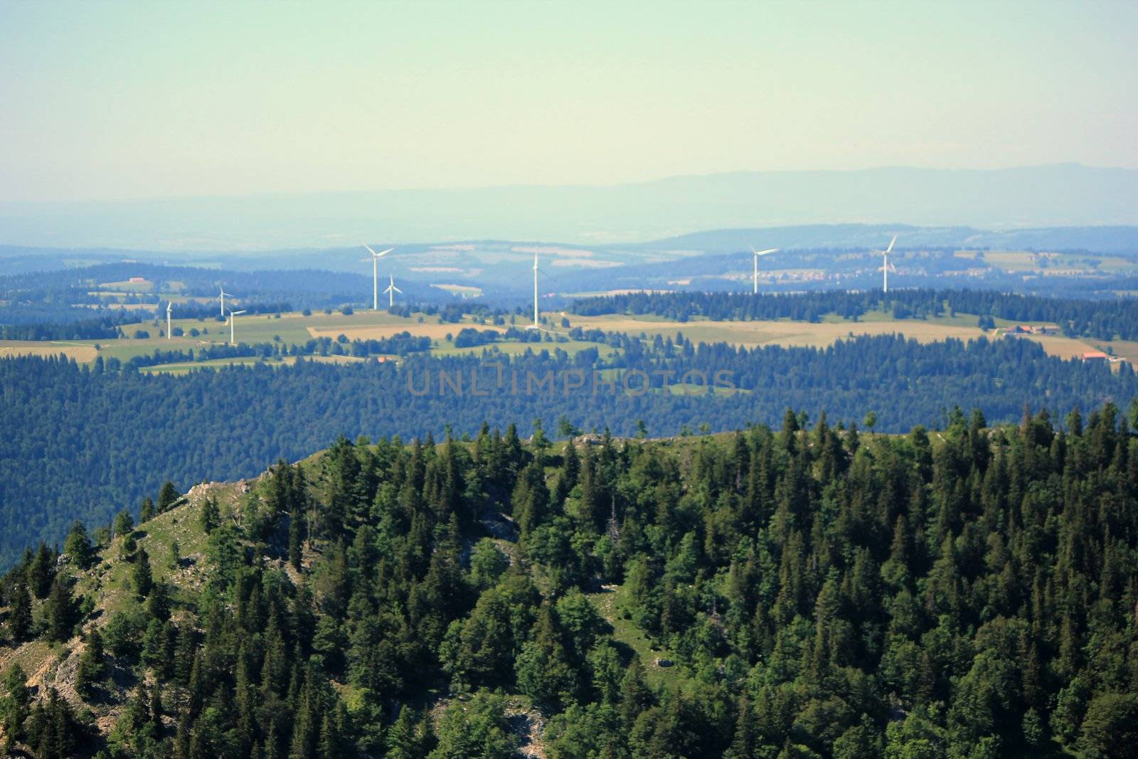 Wind turbines in Jura, Switzerland by Elenaphotos21