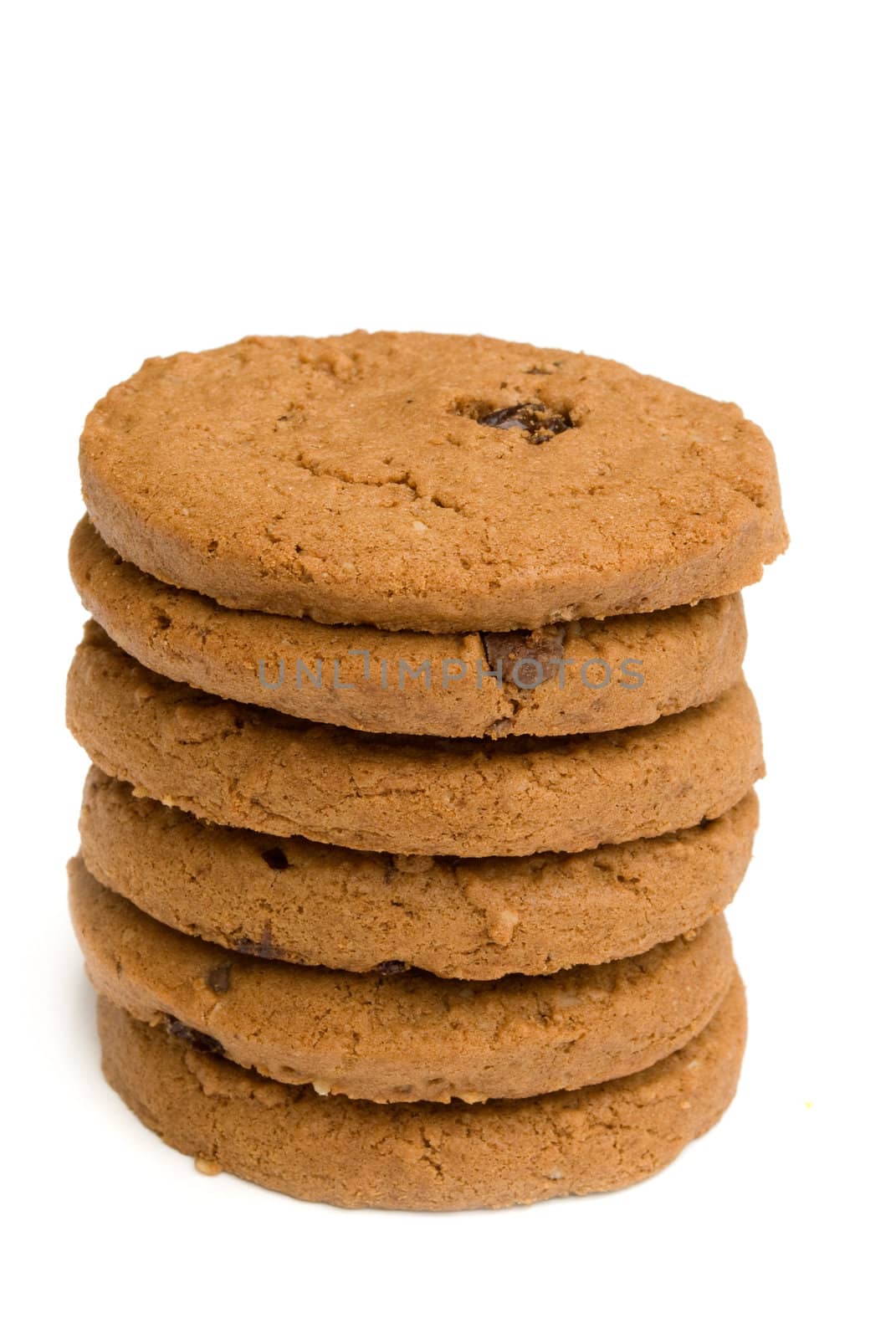 pile of chocolate cookies isolated on white background