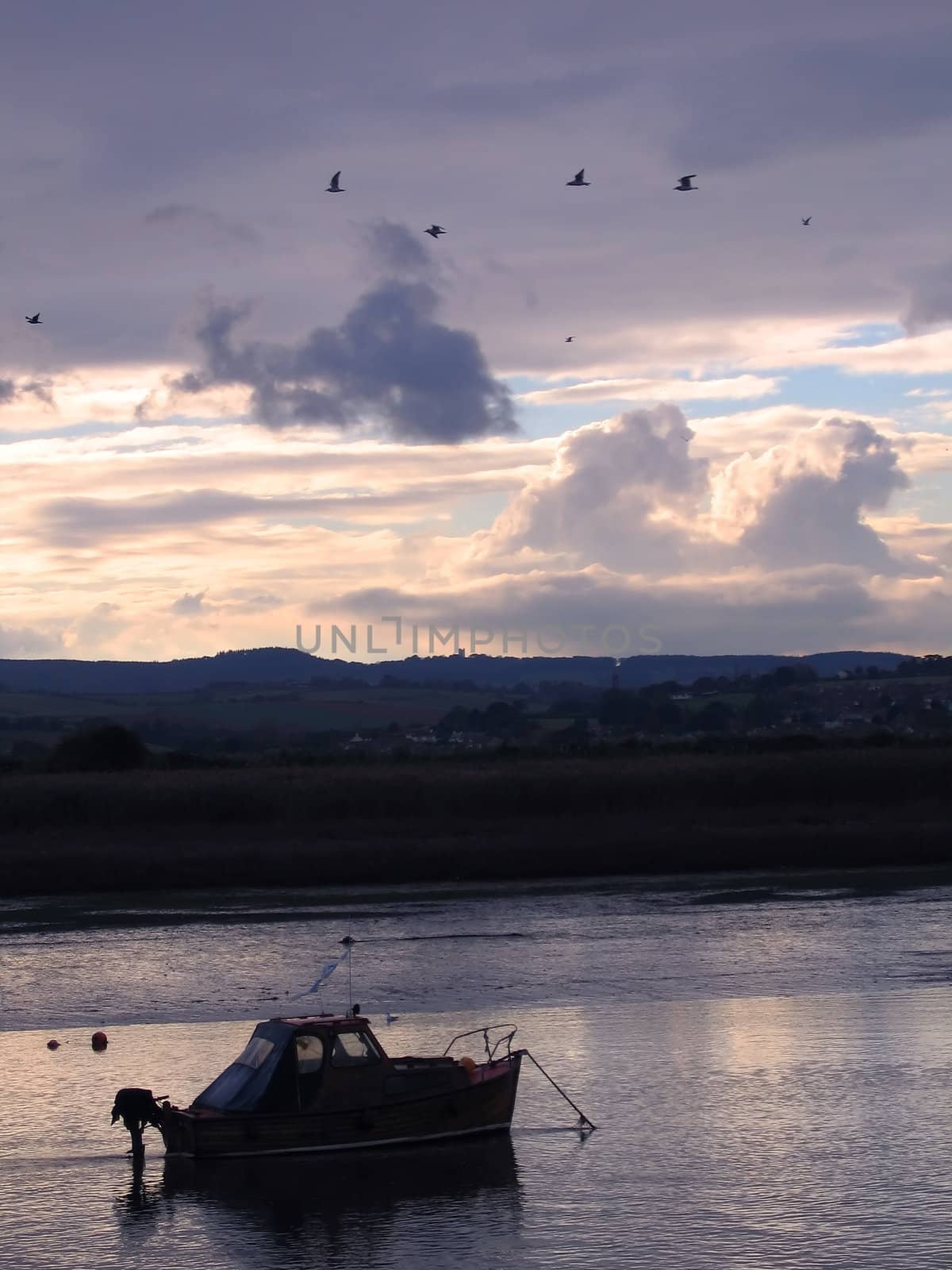 Pleasure Boat at Sunset on South Devon River