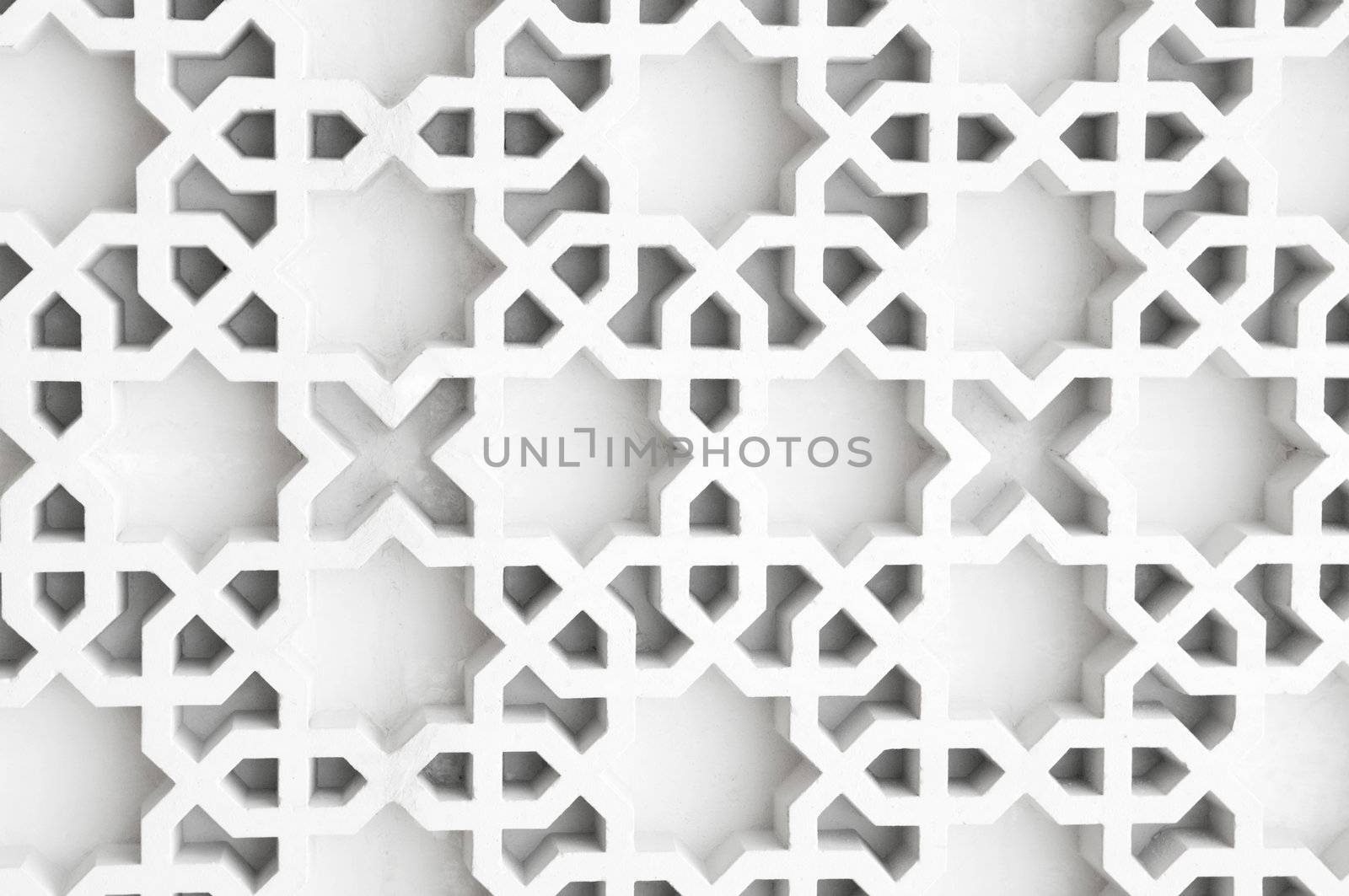 An example of Islamic design cast in concrete on a building in Malaysia.