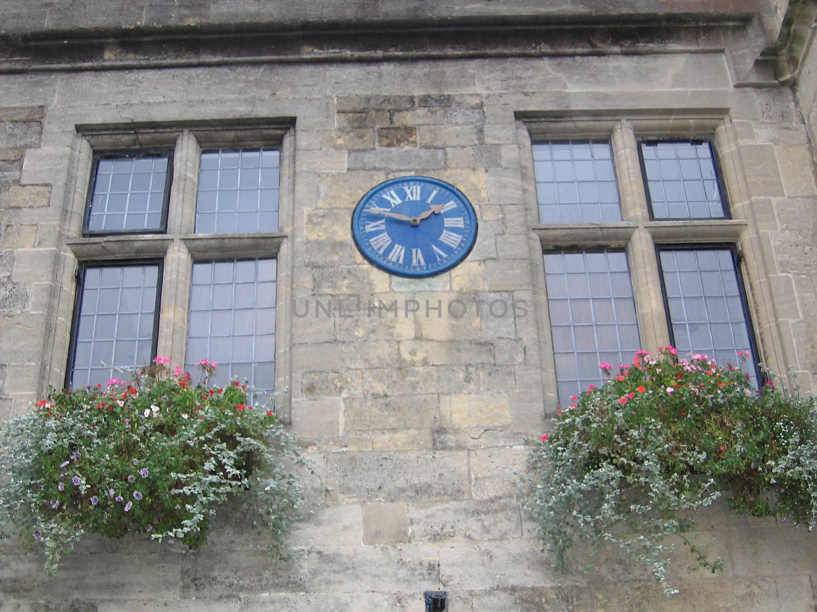 Blue Clock and Flowers in Window Boxes by green308