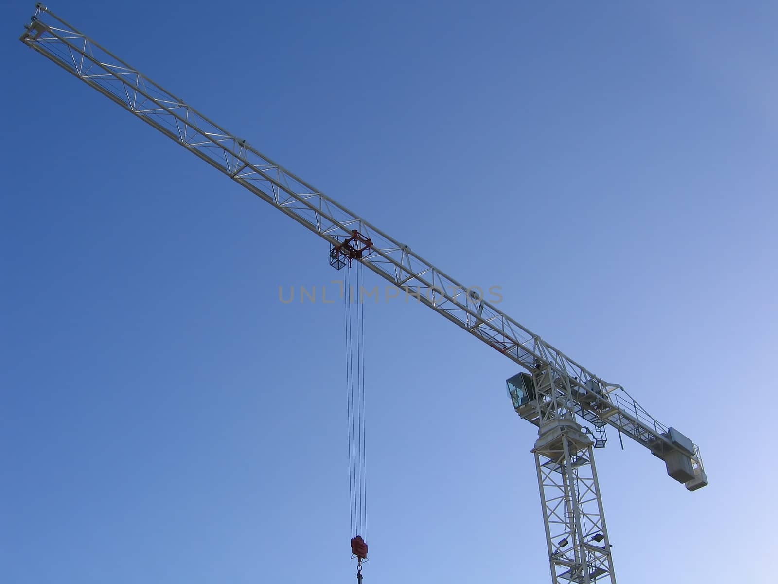 Tall Construction Crane on a Sunny Day