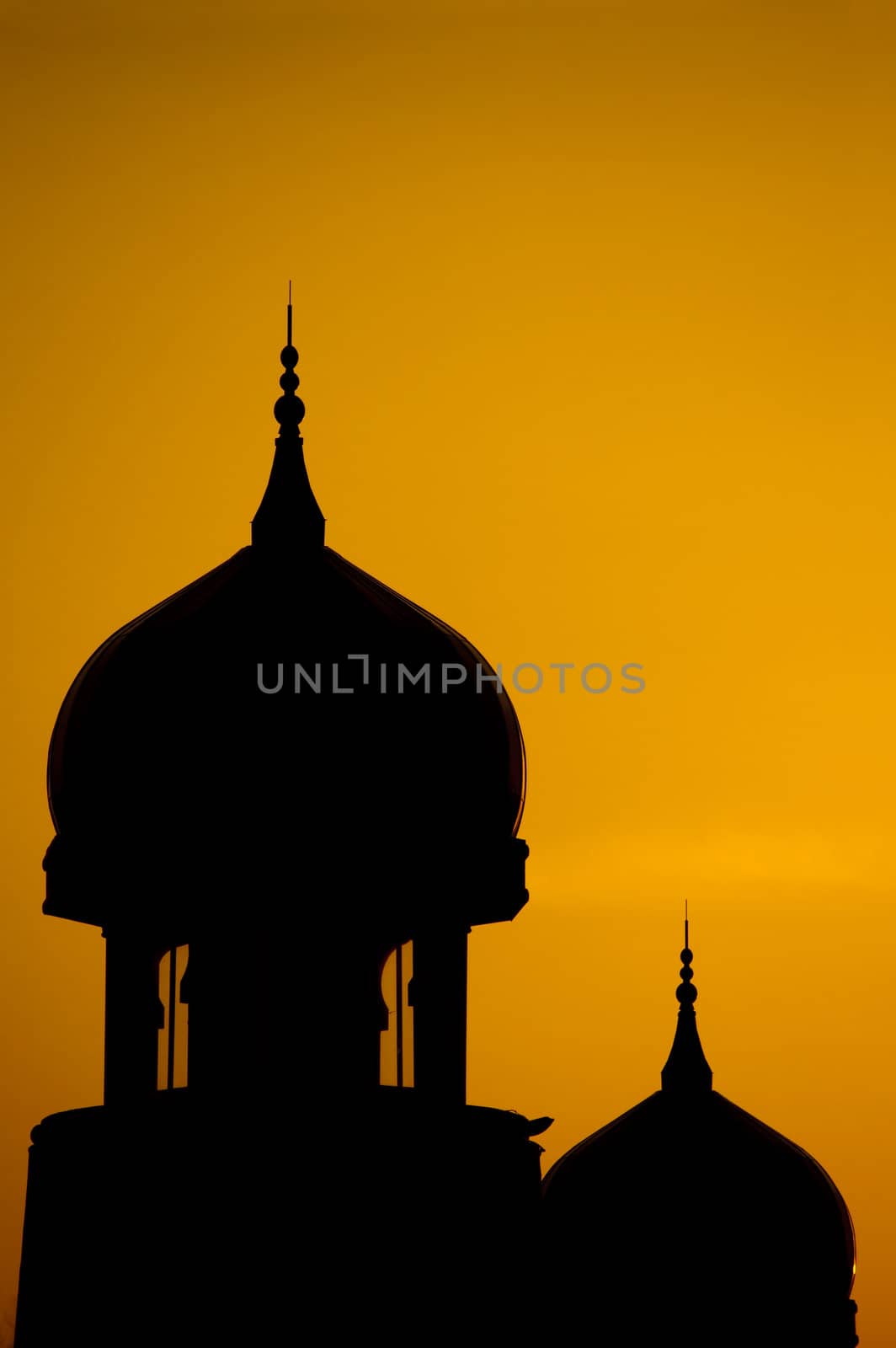 Silhouette of a mosque in sunset.