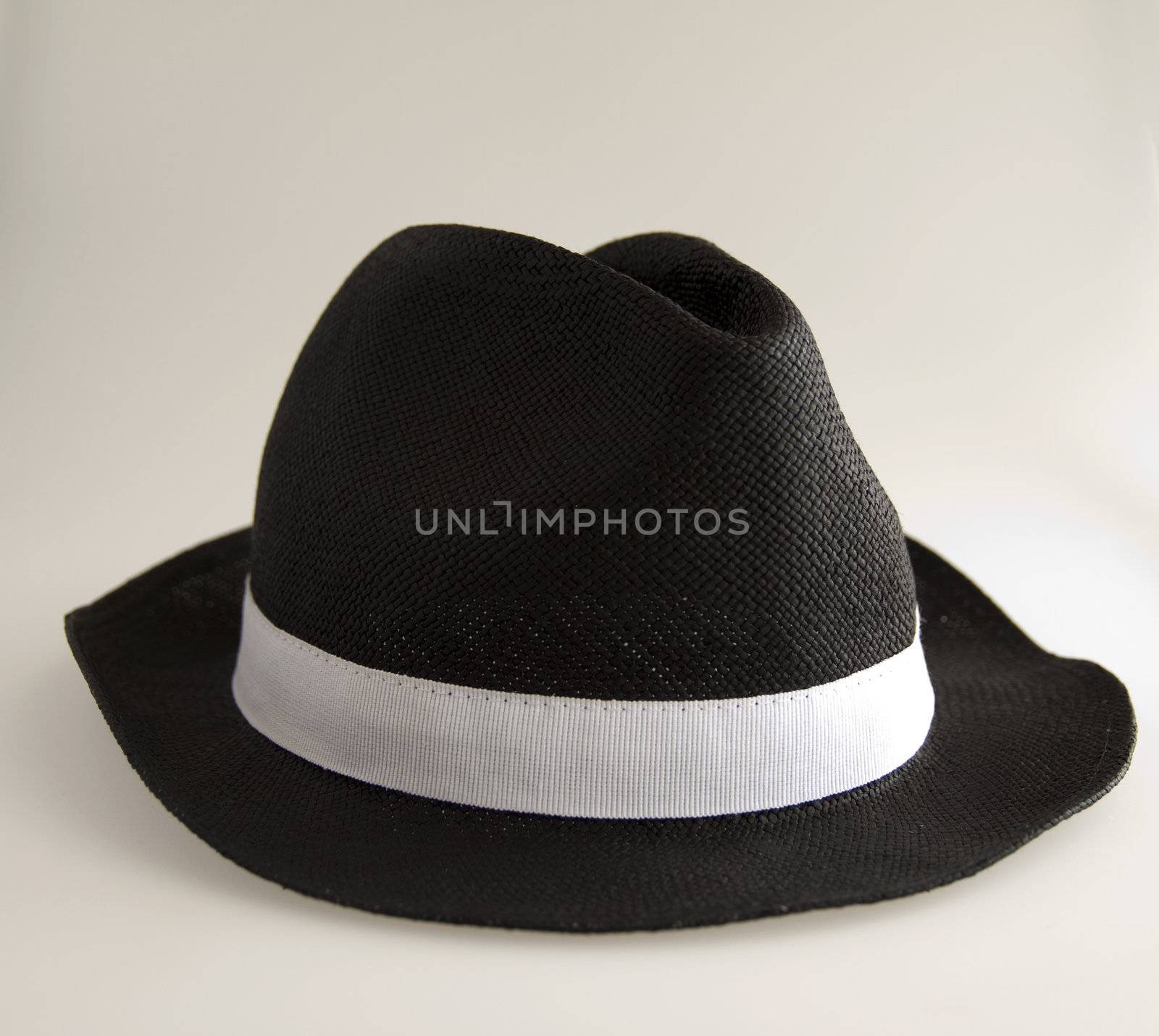 Black and white man's hat on white background