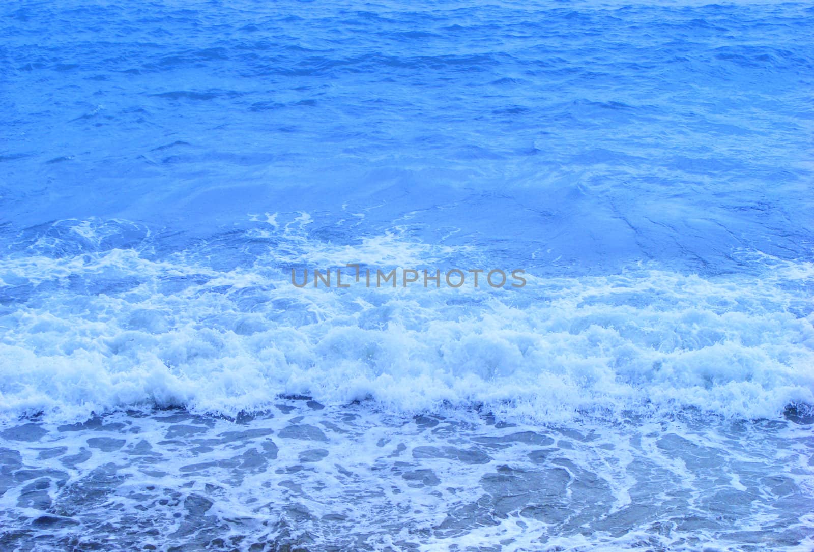 Blue Waves of sea coming to the beach