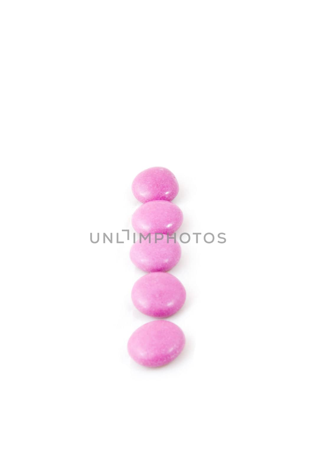 number one made of candies isolated on white by ladyminnie