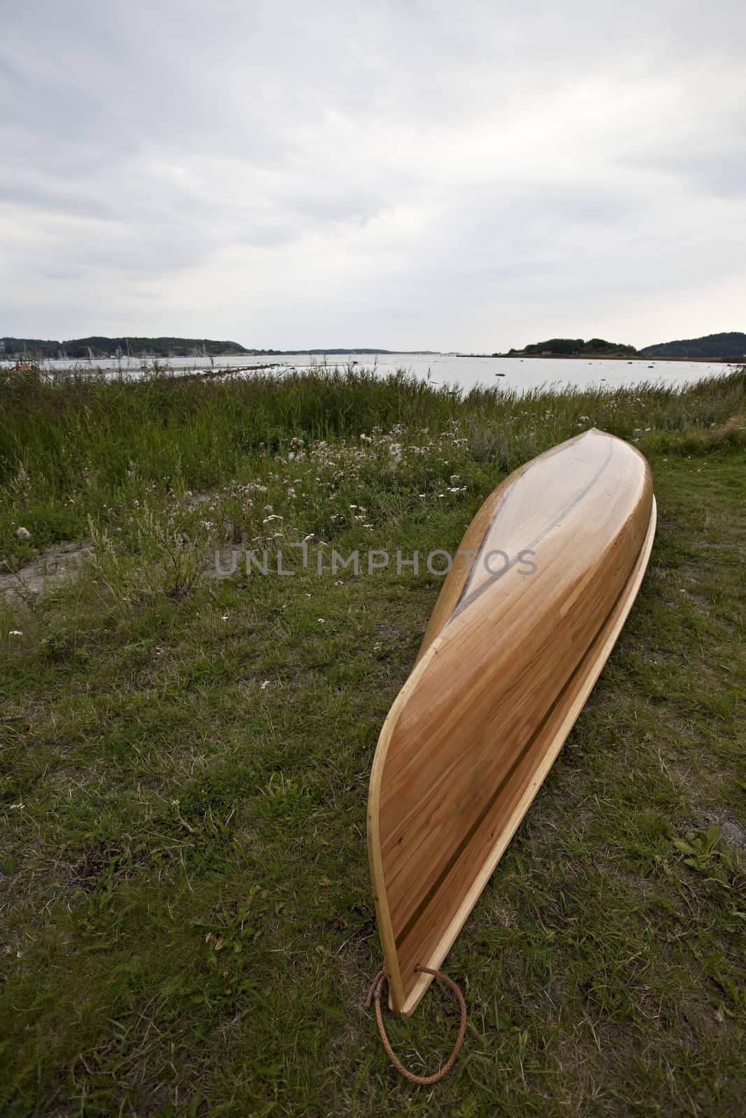 wooden canoe on the grass