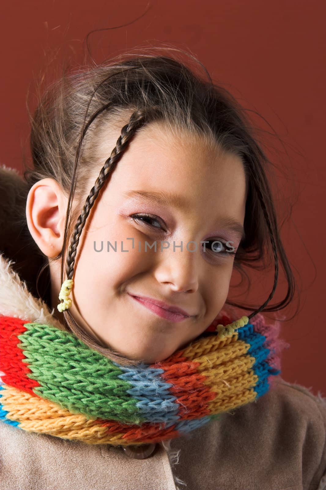 little pretty child with coat and scarf