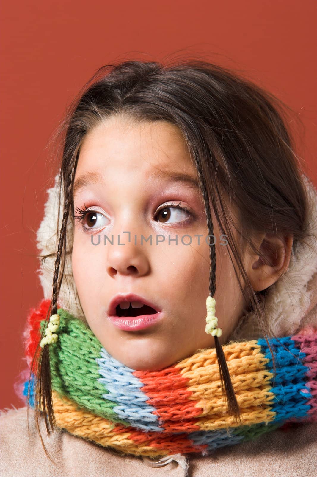 little pretty child with coat and scarf