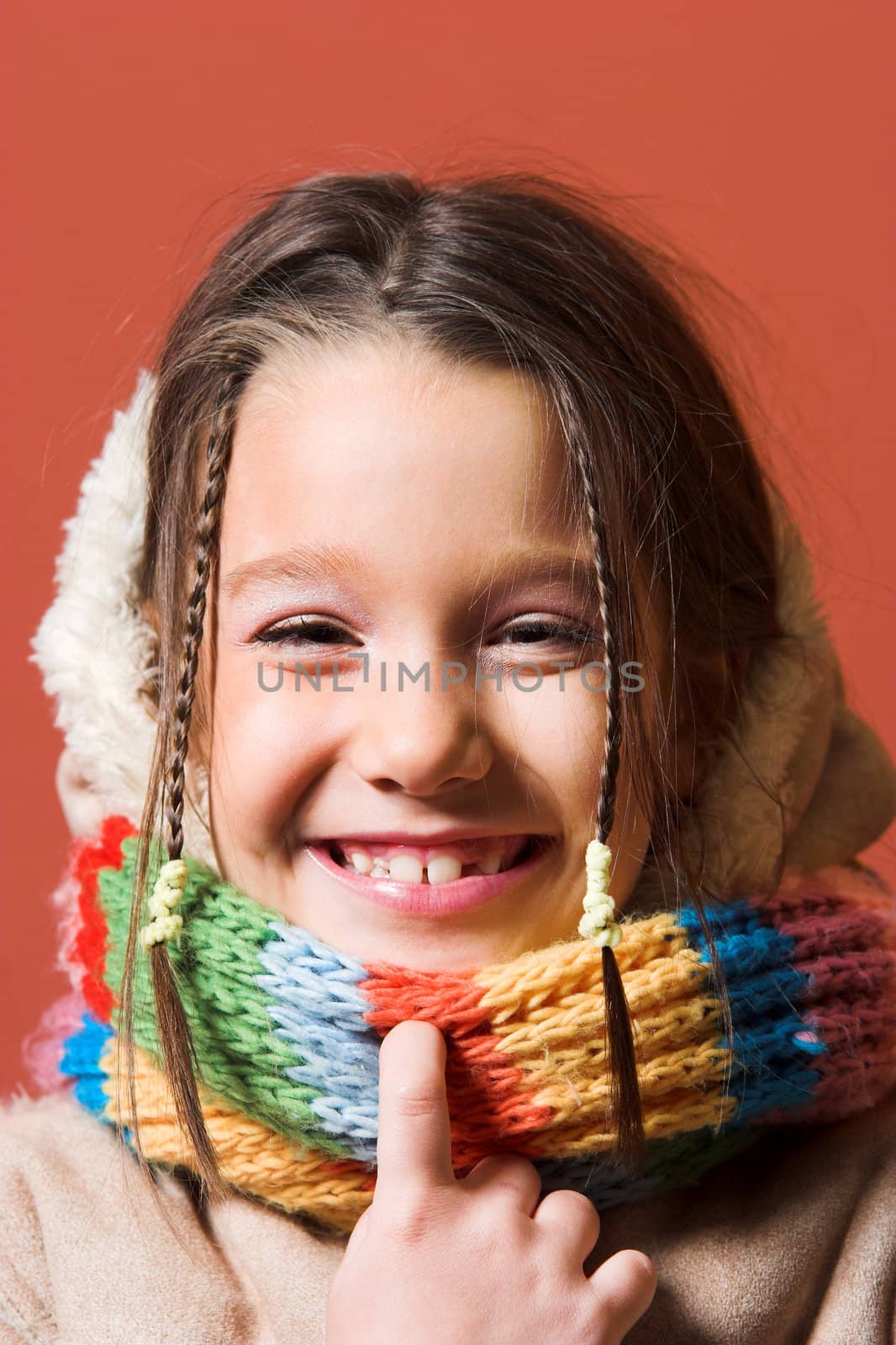 little pretty child with coat and scarf