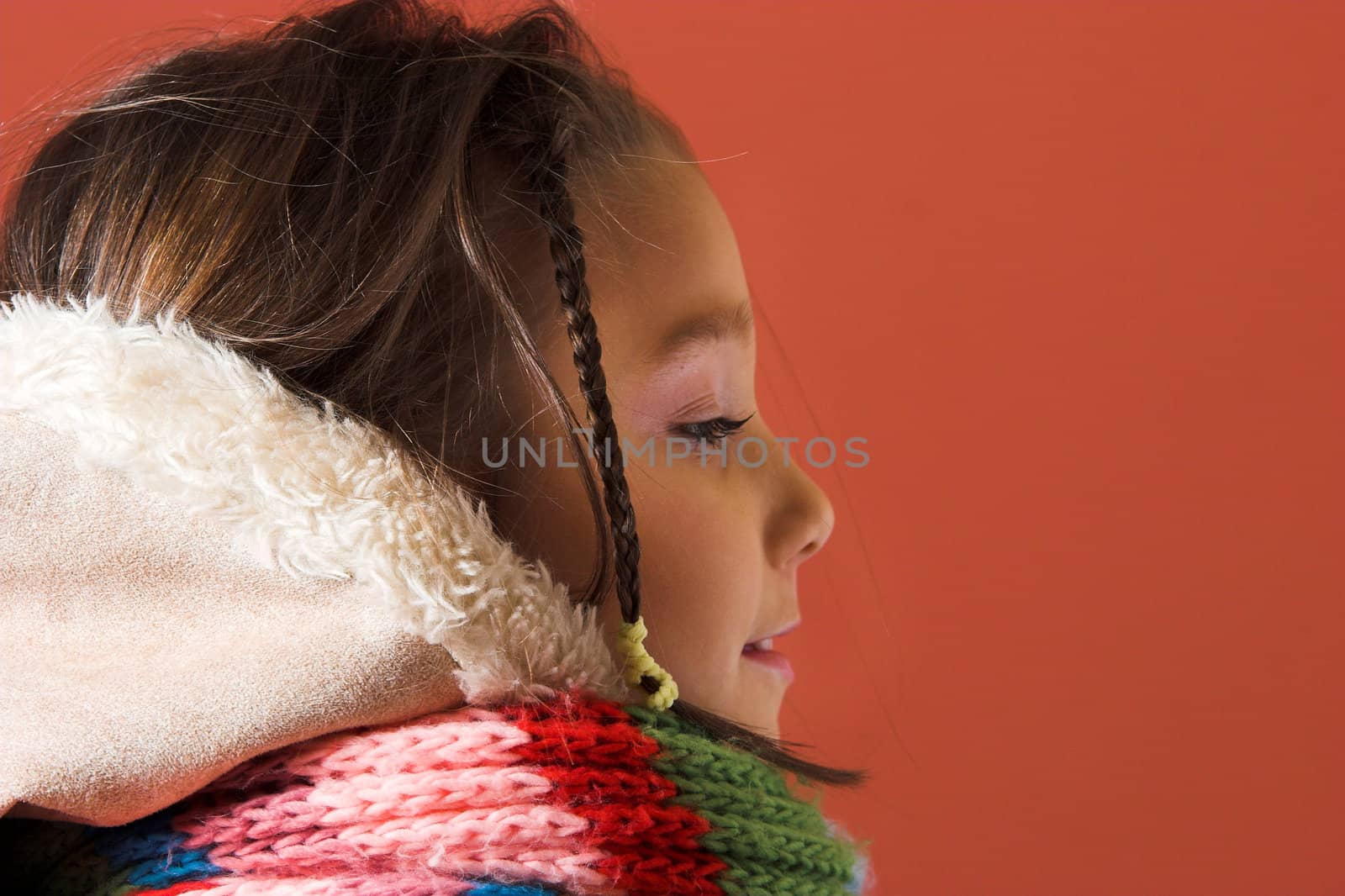 little pretty child with coat and scarf