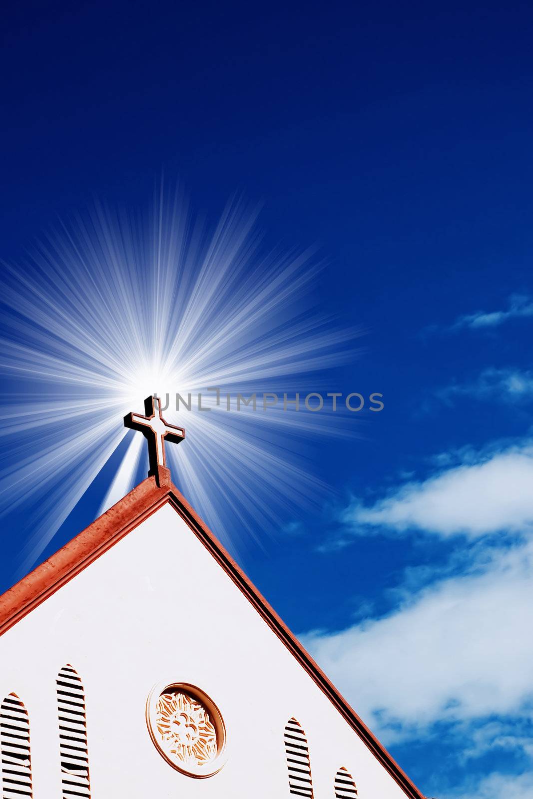 church with sun and blue sky 