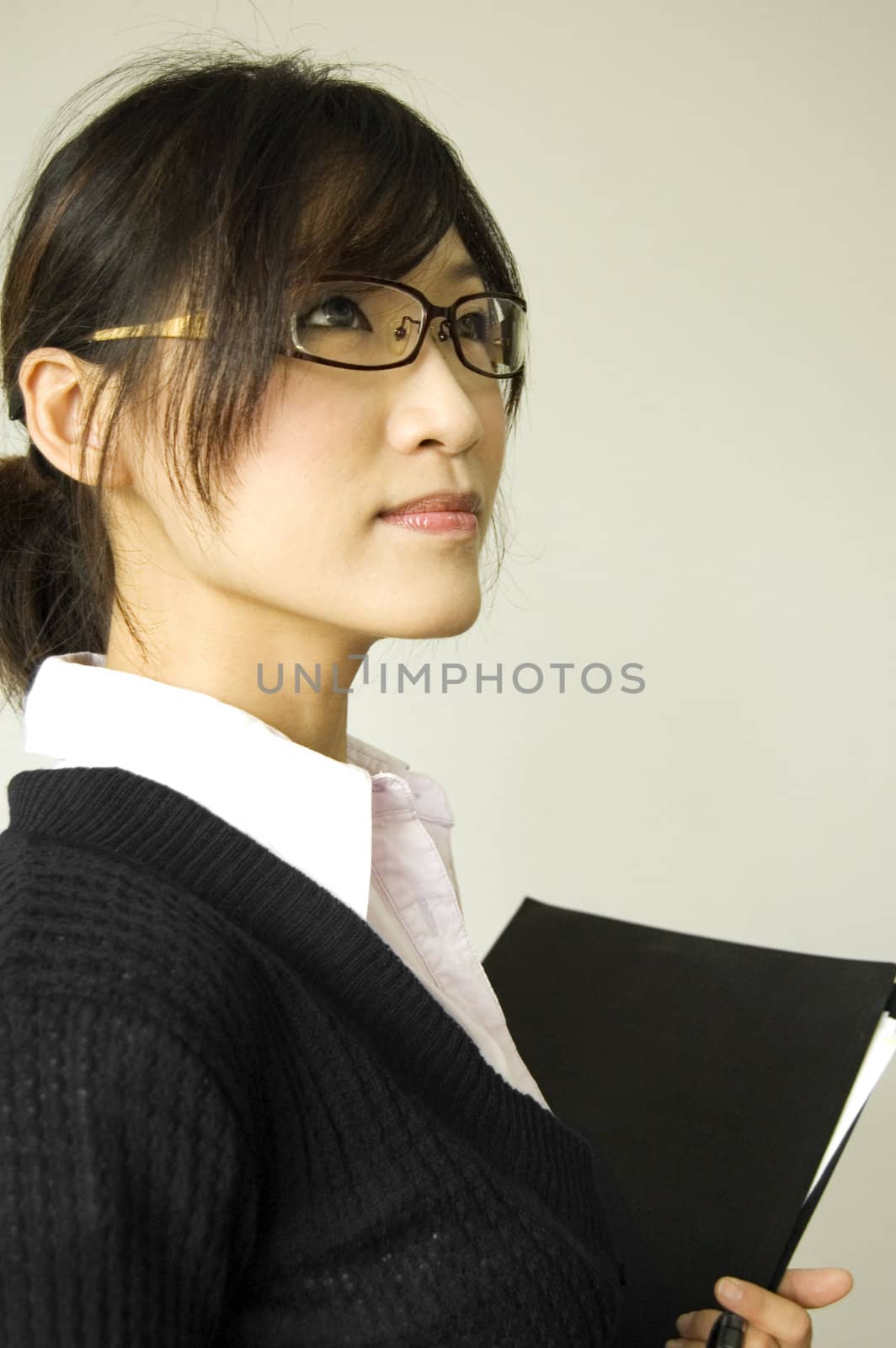 young women holding a file 