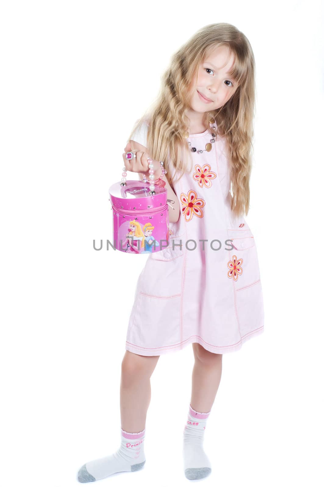 Shot of little girl playing bag  in studio