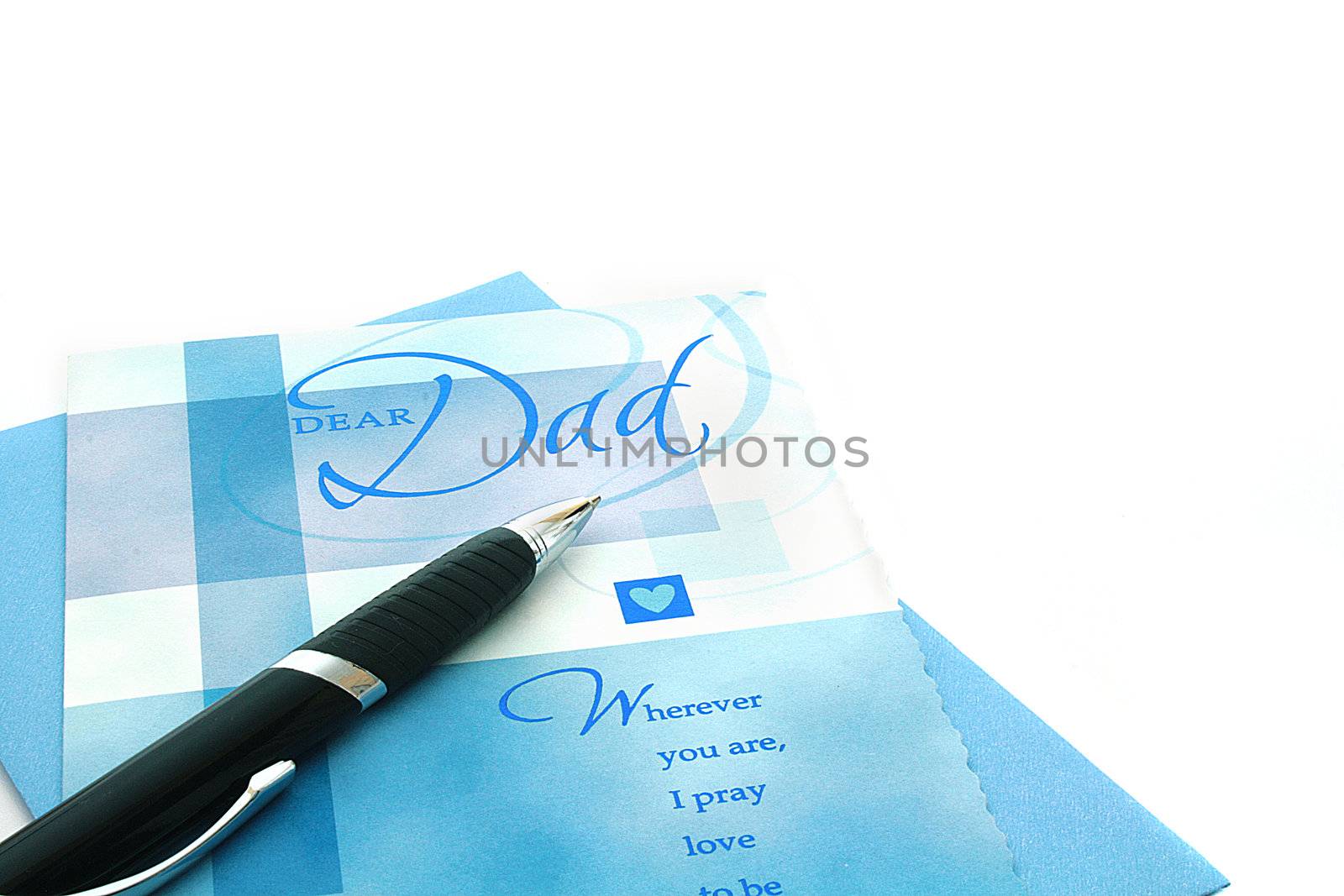 The black pen against congratulatory cards to Father day.
