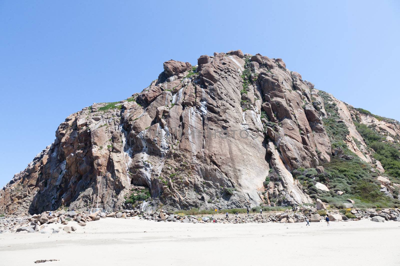 Morro Rock is a 581-foot (177 m) volcanic plug located just offshore from Morro Bay, California