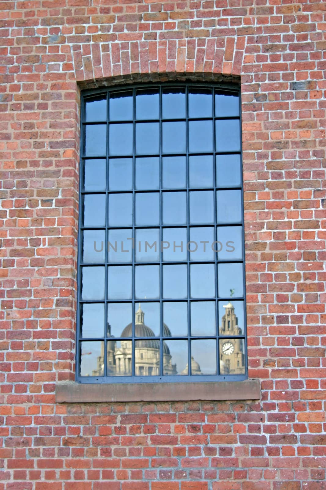 Liver Building  and 3 Graces Reflected in Warehouse Window in Li by green308