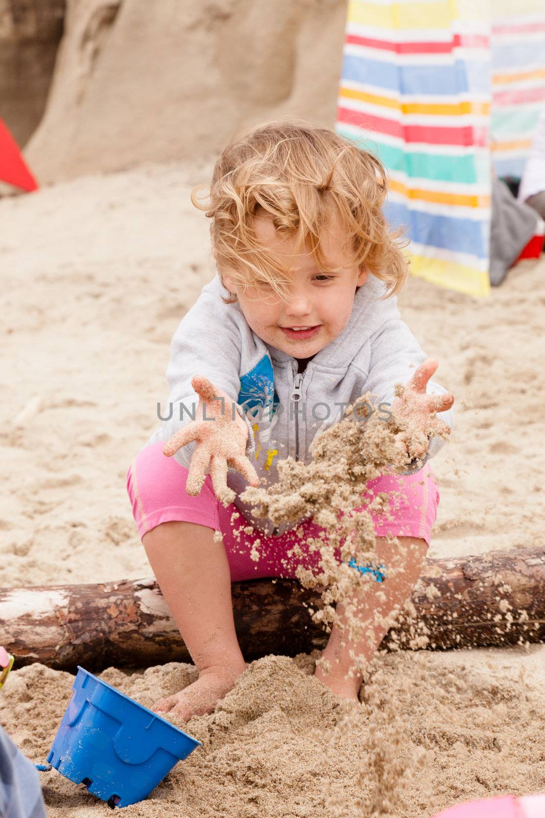 Playing on the beach by melastmohican