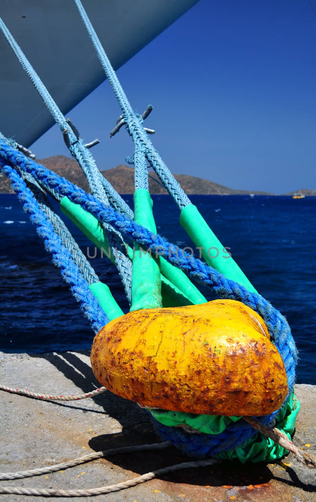 Ship tied to mooring cleat