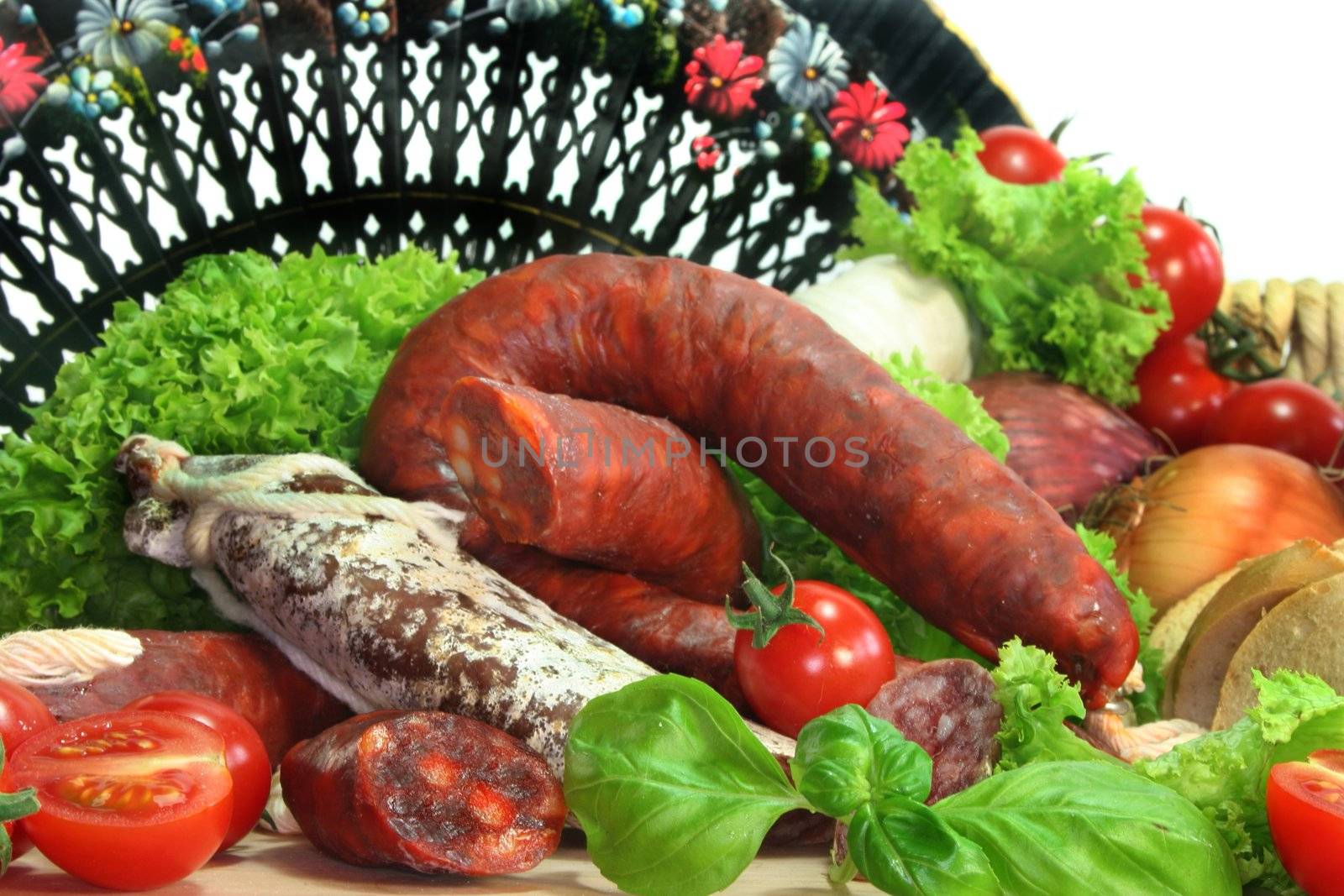 dried Spanish sausage with vegetables and herbs