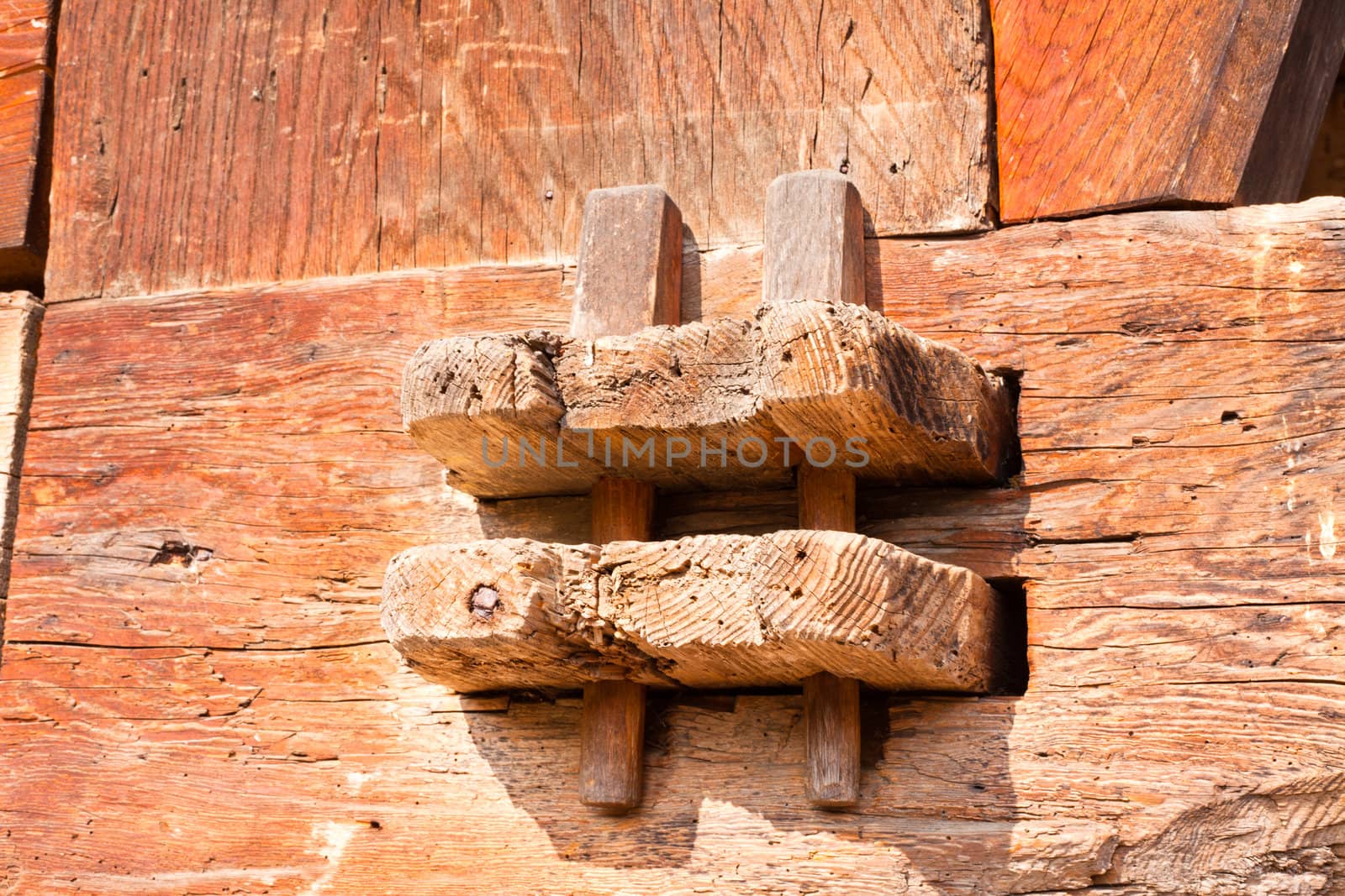Detail of old hand-crafted wooden joint on historic Black Forest farmhouse, Germany.