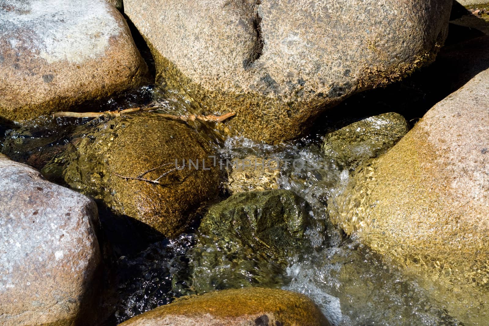 big stones in the stream 
