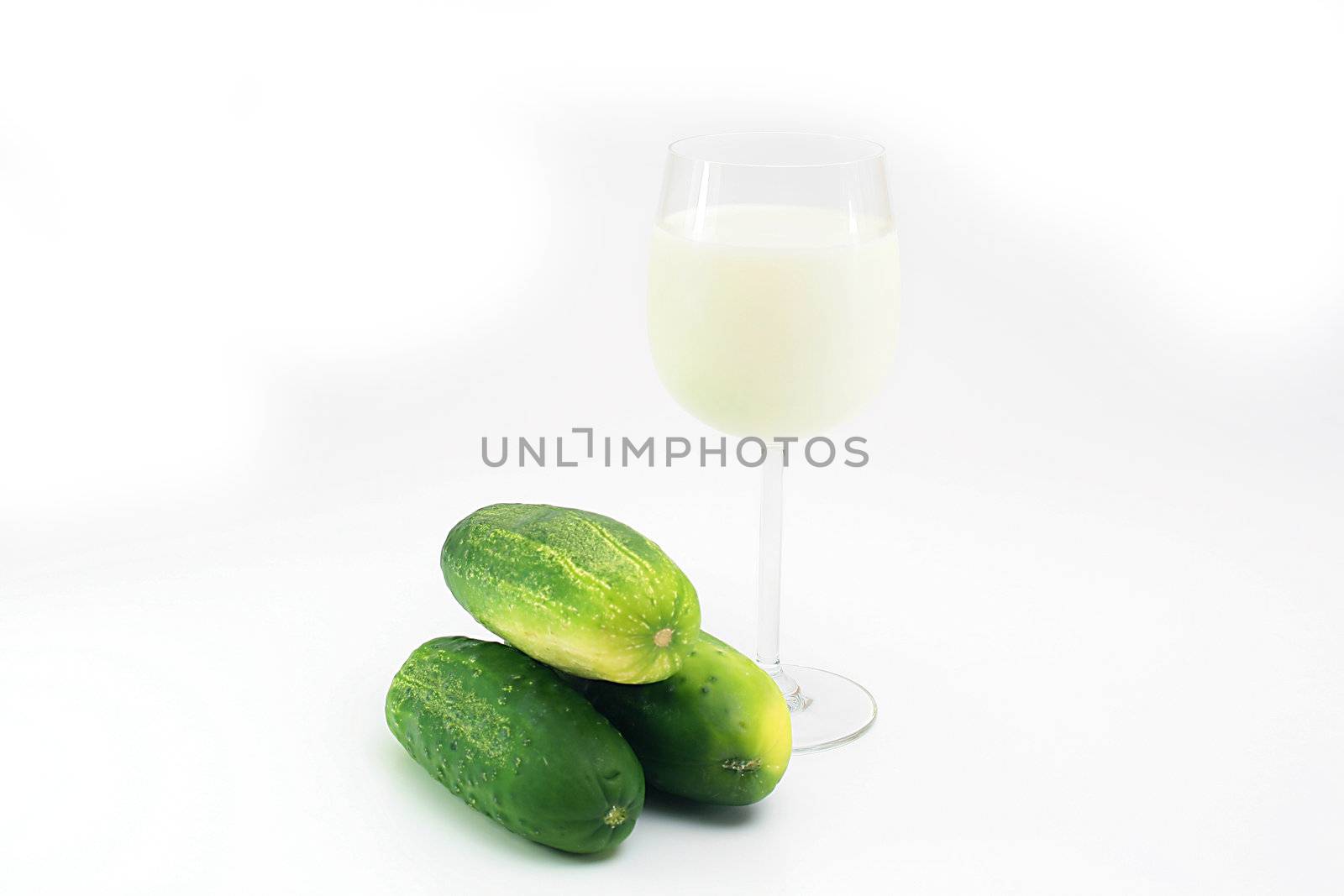 The combination of a crude cucumber and fresh milk leads to diarrhoeia. In a photo three cucumbers and a milk glass.