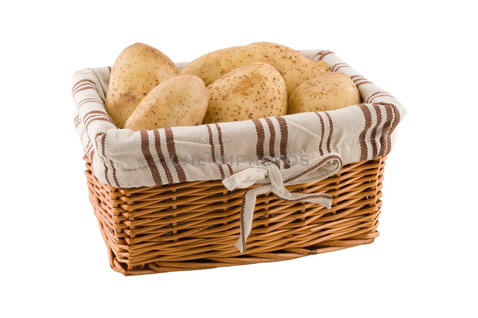 Potatoes in a woven basket isolated on a white background, clipping path.
