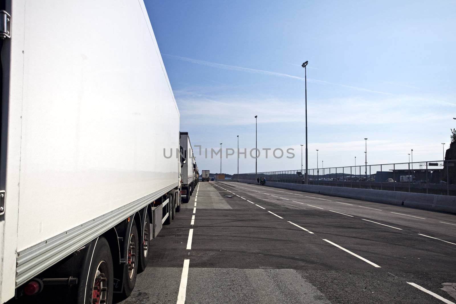 side of a truck on a parking lot