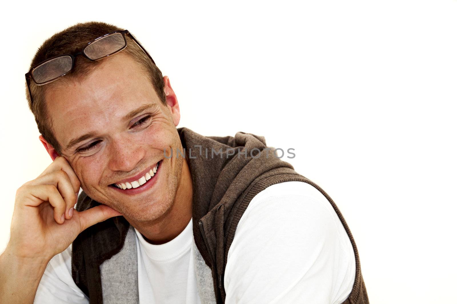 smiling young man with glasses