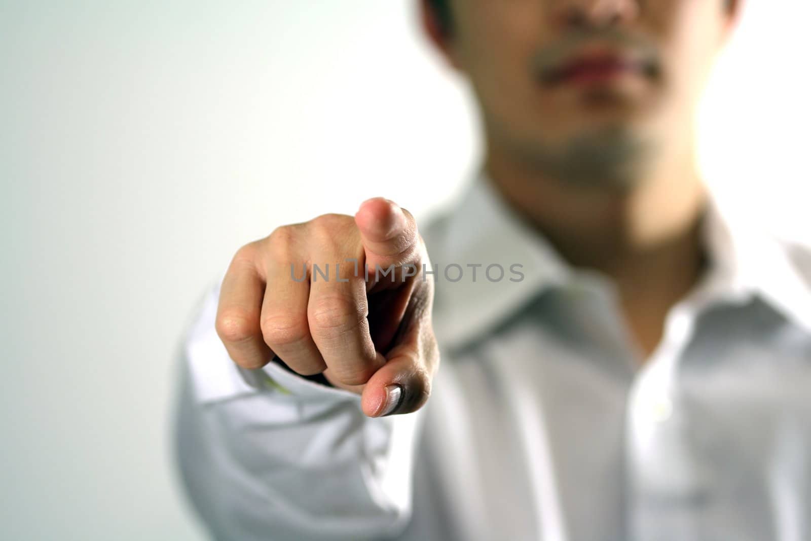 Businessman pointing at you