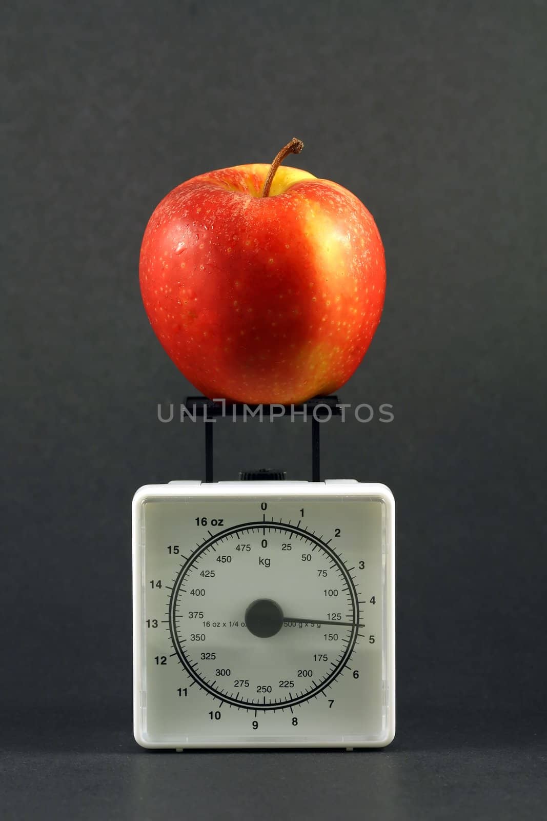 Apple on weight scale