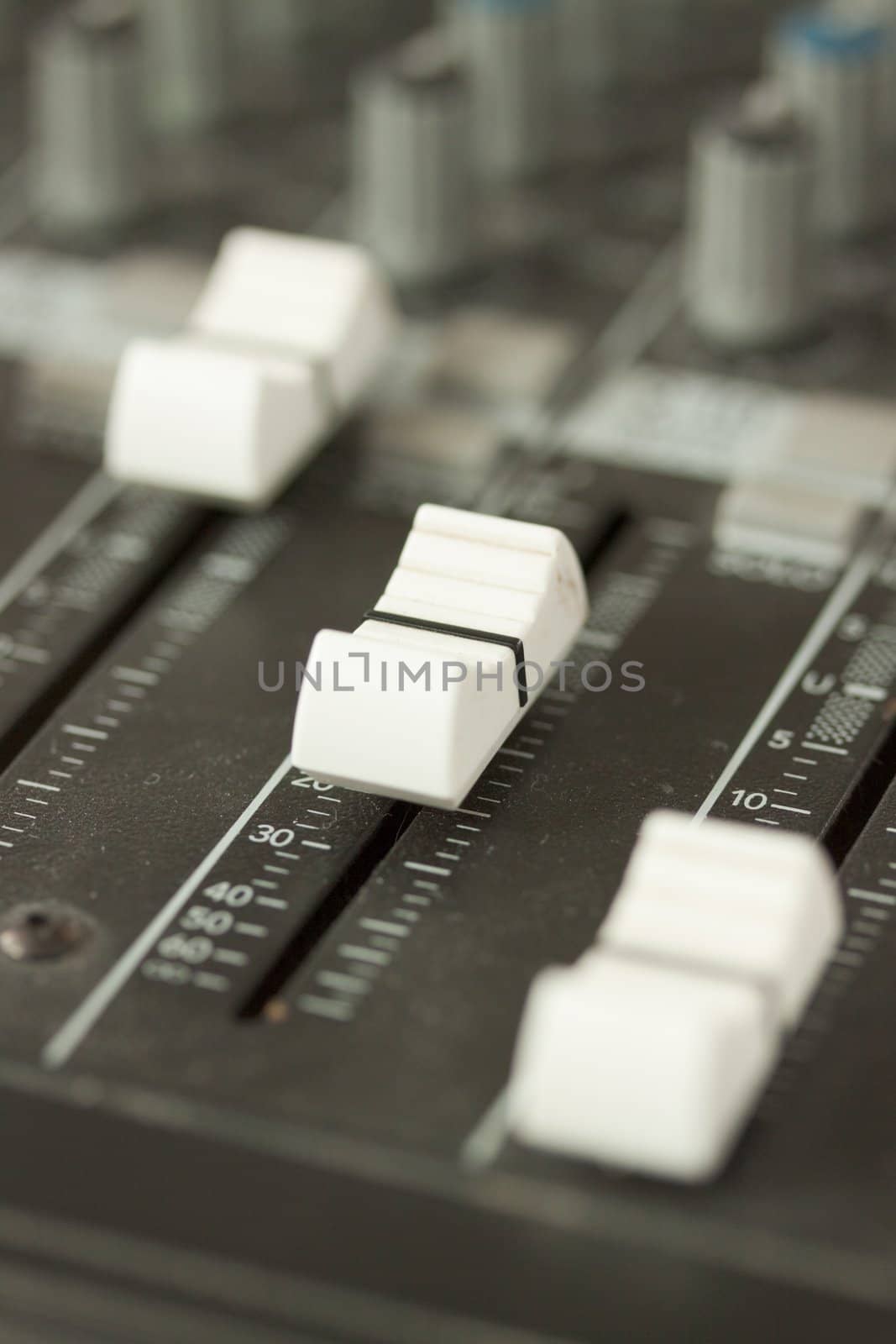 Musical equipment photographed in a nightclub, macro